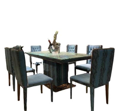 China European unique design snakeskin leather stone top dining table sets artistic tasted marble top dining table for sale