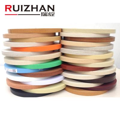 China PVC Ruizhan Thickness 0.4Mm- 2Mm PVC Office Wood Furniture Dark Edging Decorative Plastic Trim Strip For Cabinet for sale