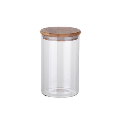 China Minimalist Fresh Keeping Clear Glass Storage Jars Airtight Kitchen Glass Jars With Wooden Lid for sale