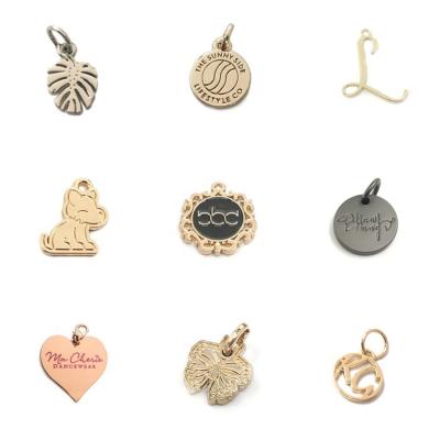 China Nickel Free Delicate Designer Custom Brand Logo Pendant Metal Jewelry Charms For DIY Bracelets for sale