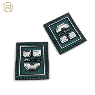 China Washable Genuine Custom Logo Embossed Leather Patch Clothing Label For Luggage for sale