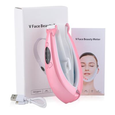 China Skin tightening current thin intelligent massage voice instrument face beauty light color hot compress emission micro to pull thin face V-shaped for sale