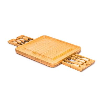 China Sustainable Wholesale Bamboo Cheese Board Server Set With 2 Drawer Charcuterie Serving Board- With Cheese Cutter for sale