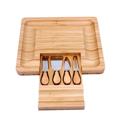 China Sustainable Organic Bamboo Cheese Cutting Board and Knife Gift Set - Wooden Serving Tray - Slide Out Drawer with Cutlery Knives for sale