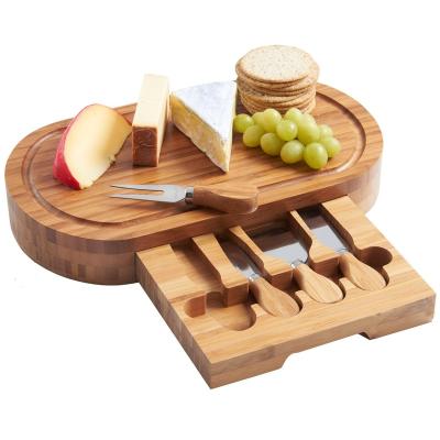 China Ideal Viable Gift Slicer Fork Knife Bamboo Wooden Cheese Board With Drawer for sale