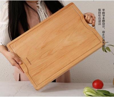 China Sustainable Solid Wood Tips For Kitchen Wood Cutting Duplex Board With Handle Wood Chopper for sale