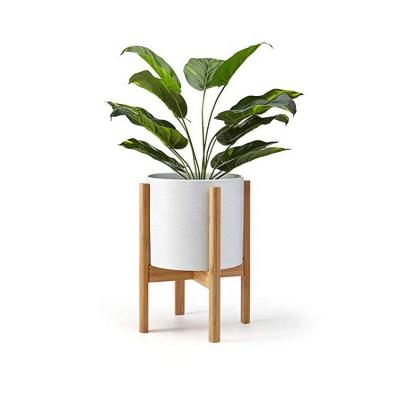 China Eco-friendly creative indoor wooden plant adjustable bamboo stand for display for sale