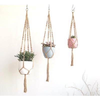 China Indoor Unique Housewares Wall Hanging Planter Basket Flower Pot Holder Plant Hanger Macrame for sale