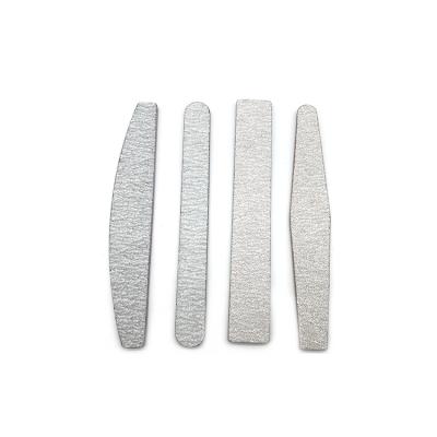 China Cute Special Hot Selling Durable Round Aluminum Oxide Mini Nail File Cute Workmanship for sale