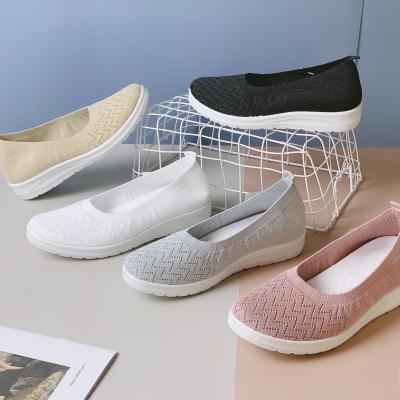 China Fashion Trend Style New Fashion Slip On Flats Ladies Sport Shoes Comfortable Flying Knit Shoes for sale