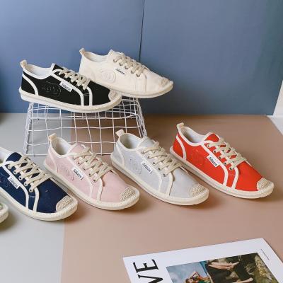 China Fashion trend factory wholesale female casual flat shoes lace up comfortable women canvas shoes for sale