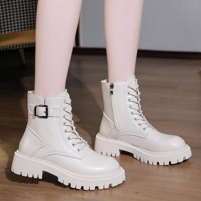 China Quick-drying fashion women bootsmid-heel black white motorcycle boots 2021 lace-up rivet chunky heel Martin boots for sale