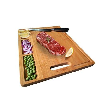 China Sustainable Organic Bamboo Kitchen Cutting Board With With Juice Groove And 3 Compartments for sale