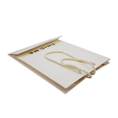 China Recyclable Custom White Paper Bags With Handles Gift Bag Shopping Paper Bags With Your Own Logo for sale