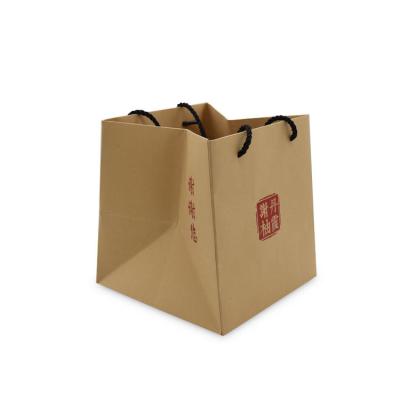 China Custom Printing Logo Kraft Paper Packaging Bag Brown Biodegradable Shopping Paper Bag Recyclable With Handle for sale