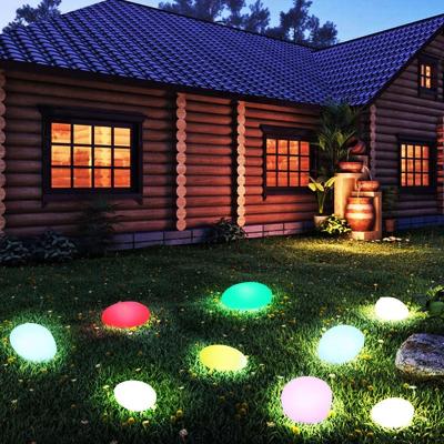 China Outdoor Solar Garden Lights, Glow Paver Stone Shape Solar Waterproof Color Changing Garden Landscape Lights with Remote Control for sale