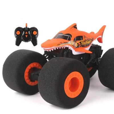 China New RC hobby Amazon style sponge wheel big feet climbing drift stunt shark remote control car rc toy filler car for sale