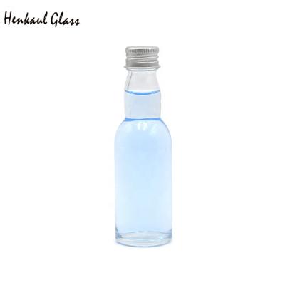 China 40ml Eco-friendly Recyclable Reusable Clear Glass Empty Mini Whiskey Bottle For Liquor Packaging for sale