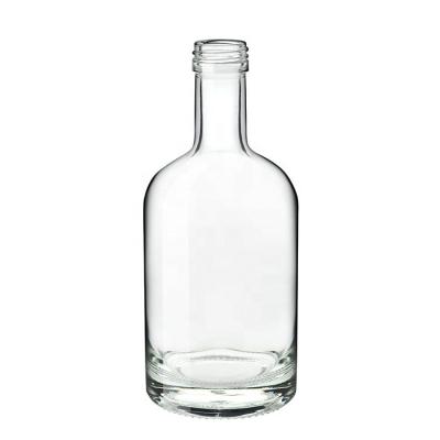 China 700ML Factory Price Eco - Friendly Recyclable Clear Round Empty Vodka Glass Bottle for sale