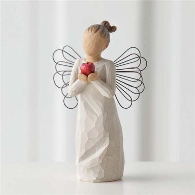 China Europe Hot Sale Statue Of Freedom With Small Handwork Resin Angel Wire Wings Holding Butterfly for sale