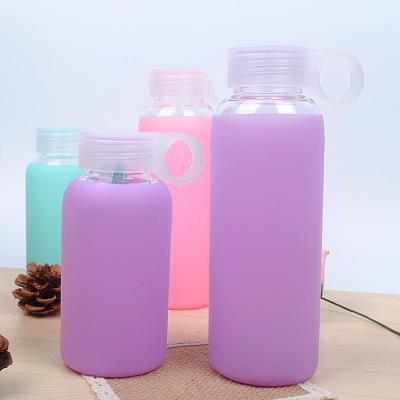 China Sustainable BPA Free Cute Glass Water Bottle With Silicone Protective Sleeve for sale