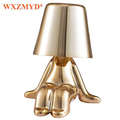 China Modern Man Gold Little Thinker Italian Desk Lights Touch Bedside Bedroom Cafe Room Decor Rechargeable Holiday LED Table Lamp for sale