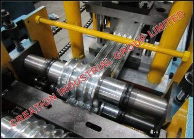 China Adjustable Iron Shutter Door Roll Forming Machine With Holes Punching Dies for sale