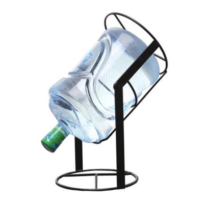 China Simple metal easy to fold 5 gallon water bottle holder for sale