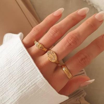 China Male Seal Ring Engraved Ring For Women High End Fashion Stainless Steel Lead Free Nickel Free Letter Rings God Portrait for sale