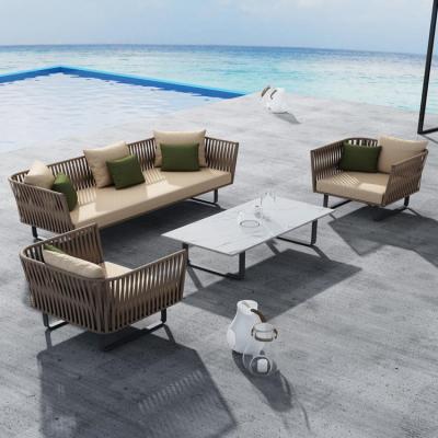 China Scandinavia Rattan Outdoor Furniture Woven Rope Chair Wicker Garden Sets Weaving Sofa With Center Table for sale