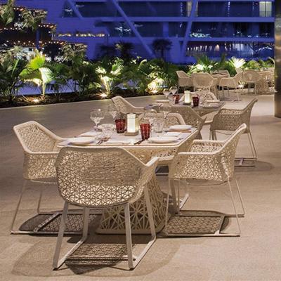 China Scandinavia rattan outdoor dining set modern patio furniture rattan chair and outdoor dining table set patio wicker dining table set wood for sale