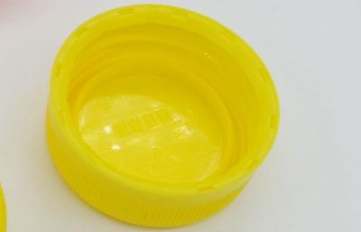 China Gele MineraalwaterKroonkurken, 38mm Plastic Kappen QS/SGS/FDA Te koop