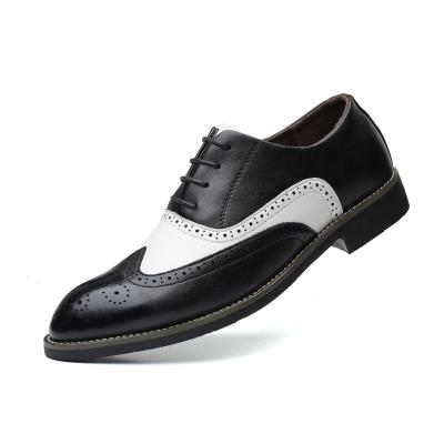 China New Style Deodorization Business Sharp Toe Black And White Cut Out Pungent Low Top Shoes Breathable And Durable Leather Shoes for sale