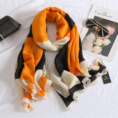 China 2021 New Design Casual Wholesale Soft Cotton Scarves For Women Elegant Custom Pattern Letter Printed Luxury Cotton Scarves Ladies Shawls for sale