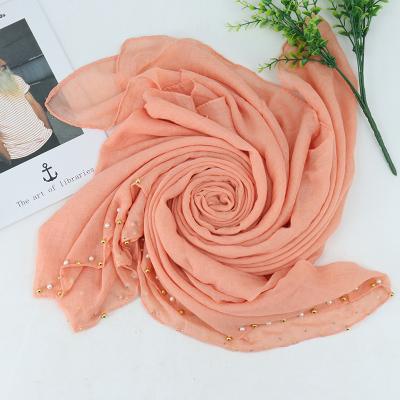 China 2021 Best Price Silk Polyester Veil Plain Pleated Elastic Comfortable Pearl Hijab On Sale At Discount for sale