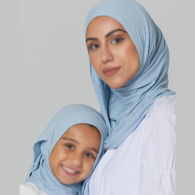 China Children's Long Hijab Islamic Girls' Hijab New Solid Color High Quality Muslim Snap Tank Top for sale