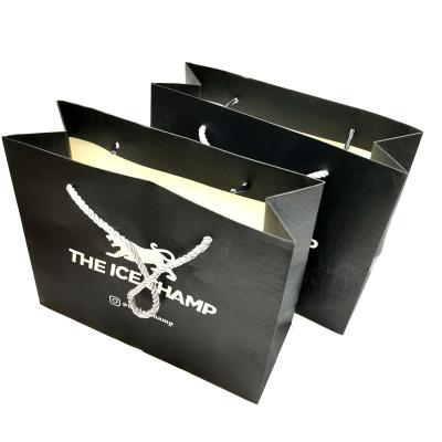 China New Design Customized Logo Recyclable Printing Black Texture Paper Bags Clothing Paper Bags for sale