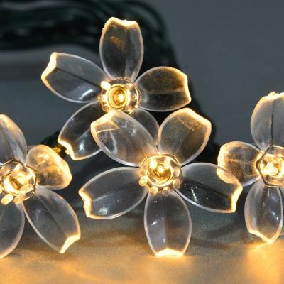 China / Solar Panel LED String Light with Peach Blossom Decoration for sale