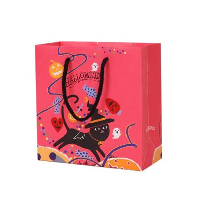 China Recyclable Wholesale Coated Paper Halloween Gift Bag With Cotton Handle For Party for sale