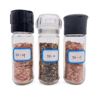 China Stocked Cheap Glass Spice Bottle With Grinder Seasoning Glass Jar for sale