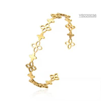 Cina Bracciale regolabile in acciaio inossidabile 304 316 316L con fiore in oro cavo stile anello in vendita