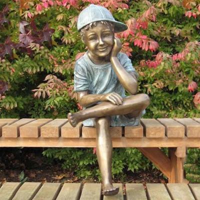 China China Foundry Bronze Life Size Cute Boy Sitting On Bench Sculpture Bronze Sculpture Boy for sale