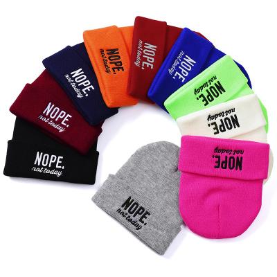 China Logo Designer Acrylic Labels Custom Wholesale COMMON Knitted Winter Thick Beanie Hats for sale