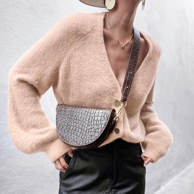 China Breathable Sweater Coat Solid Color Female V-Neck Knit Cardigan Autumn Winter New Loose Fashion Design Sweater for sale