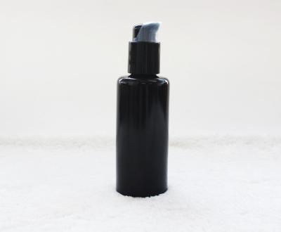 China Personal Care 50ml (1.7 fl oz) Black Ultra Violet Push Pump Glass Bottle for sale