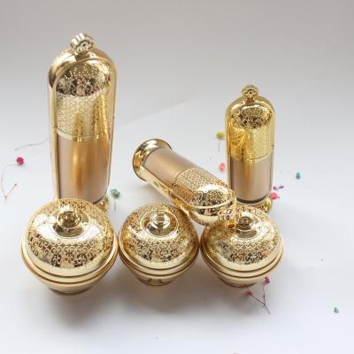 China Skin Care Cream Acrylic Cosmetic Bottle And Jar With Gold Lid Customized Bump Design for sale