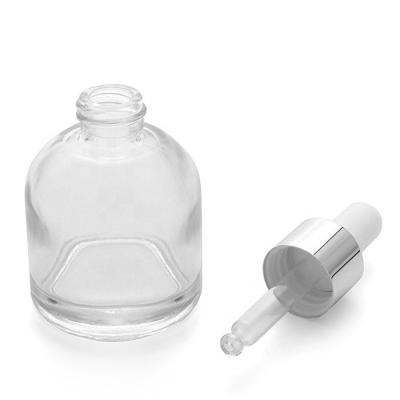 China Personal Care 30ml Short Round Shape Transparent Fat Dropper Bottle Glass for sale