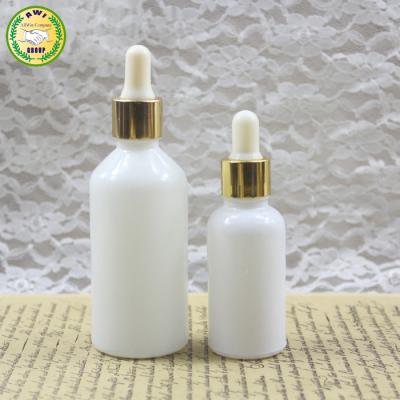 China Personal Care 5ml 10ml 15ml 20ml 30ml 50ml 100ml White Opal Glass Cosmetic Bottle With Bamboo Dropper Packing Essential Oil for sale