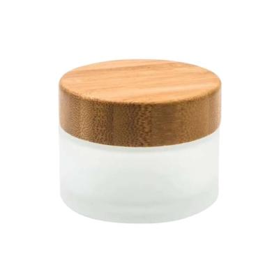 China Luxury Amber Cosmetic Bottle Face Cream Jar Skin Care Frosted Glass Packaging With Bamboo Lid for sale