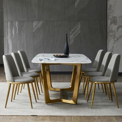 China Stainless Steel Adjustable Frame Gold Chair Fashion 6 Seaters Marble Top Table (Other) and PU Leather Dining Chair Set for sale